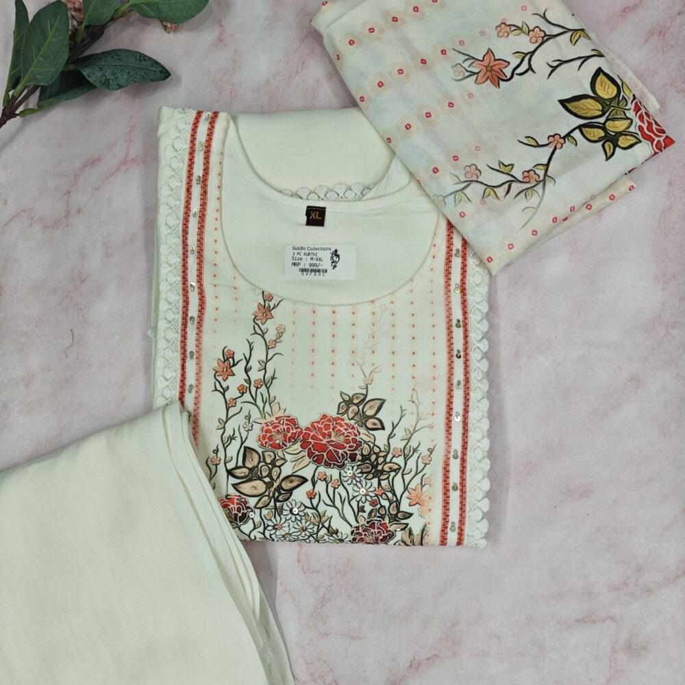 Abstract pattern kurti with pants and chiffon dupatta.