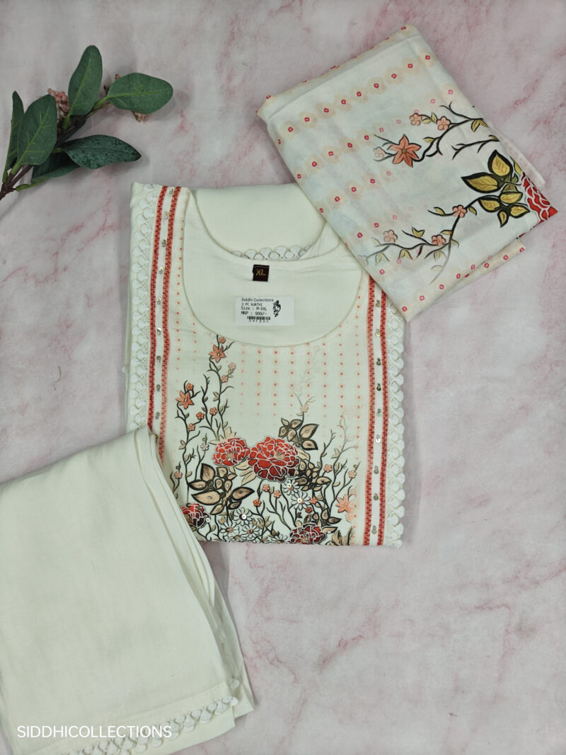 Abstract pattern kurti with pants and chiffon dupatta.